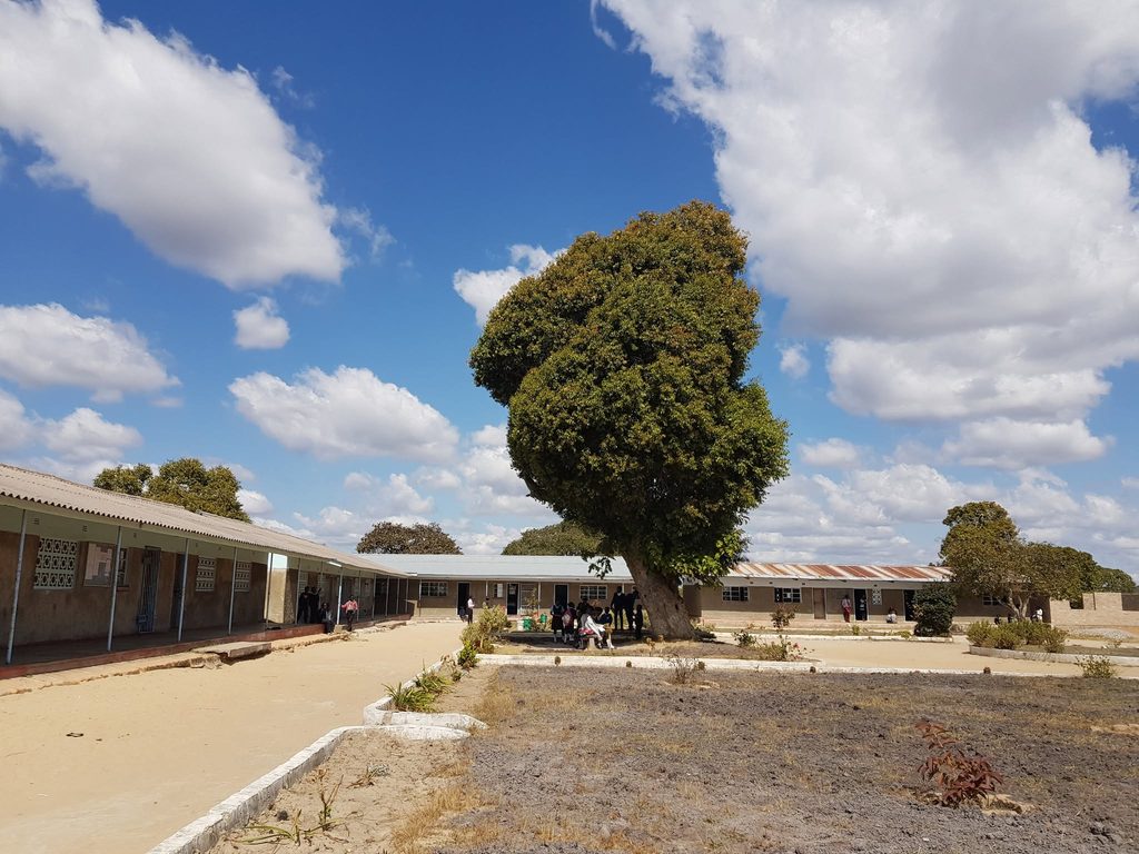 School courtyard and classroom buildings